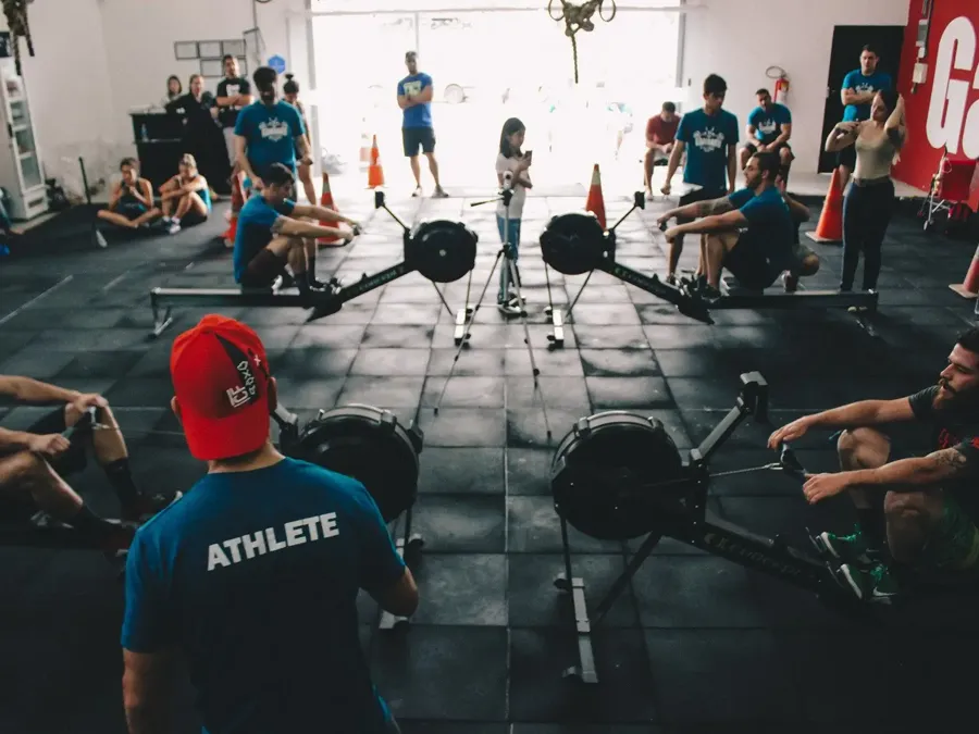 High-energy CrossFit workout in progress with athletes performing functional movements