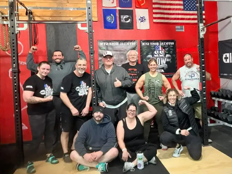 High-energy CrossFit workout in progress with athletes performing functional movements